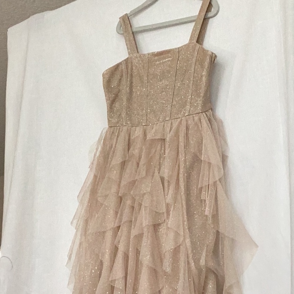 Extraordinary sleeveless shimmery dress
Exceptional used condition